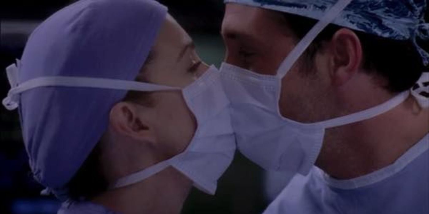 Derek and Meredith kiss while in surgery in Grey's Anatomy