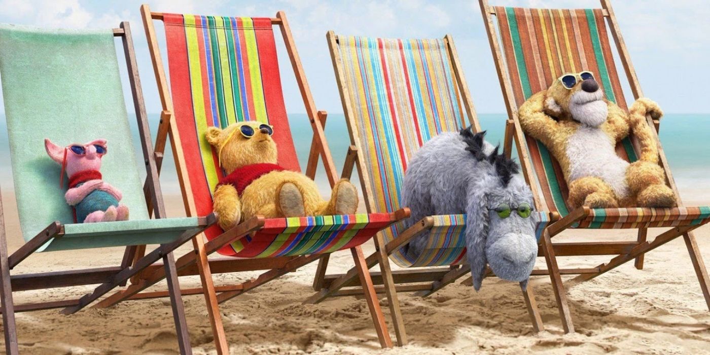 Piglet, Pooh, Eeyore y Tigger en acción real descansando en sillas de playa