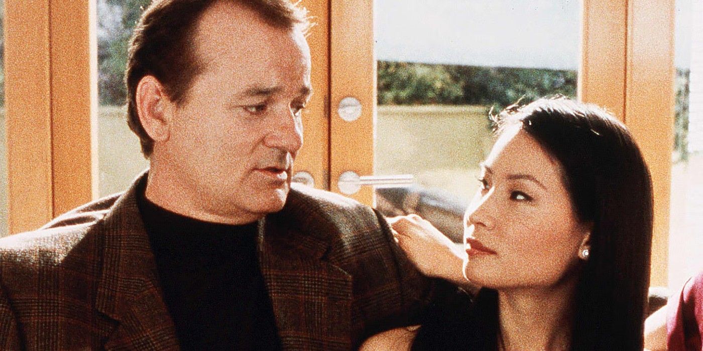 Bill Murray and Lucy Liu looking at each other while sitting on a couch in Charlie's Angels